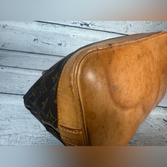 Louis Vuitton Alma Brown Canvas Monogram Leather Handbag - Picture 9 of 16